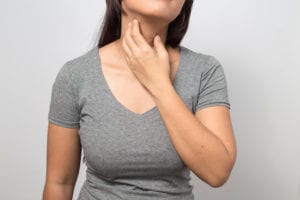 Woman with neck pains