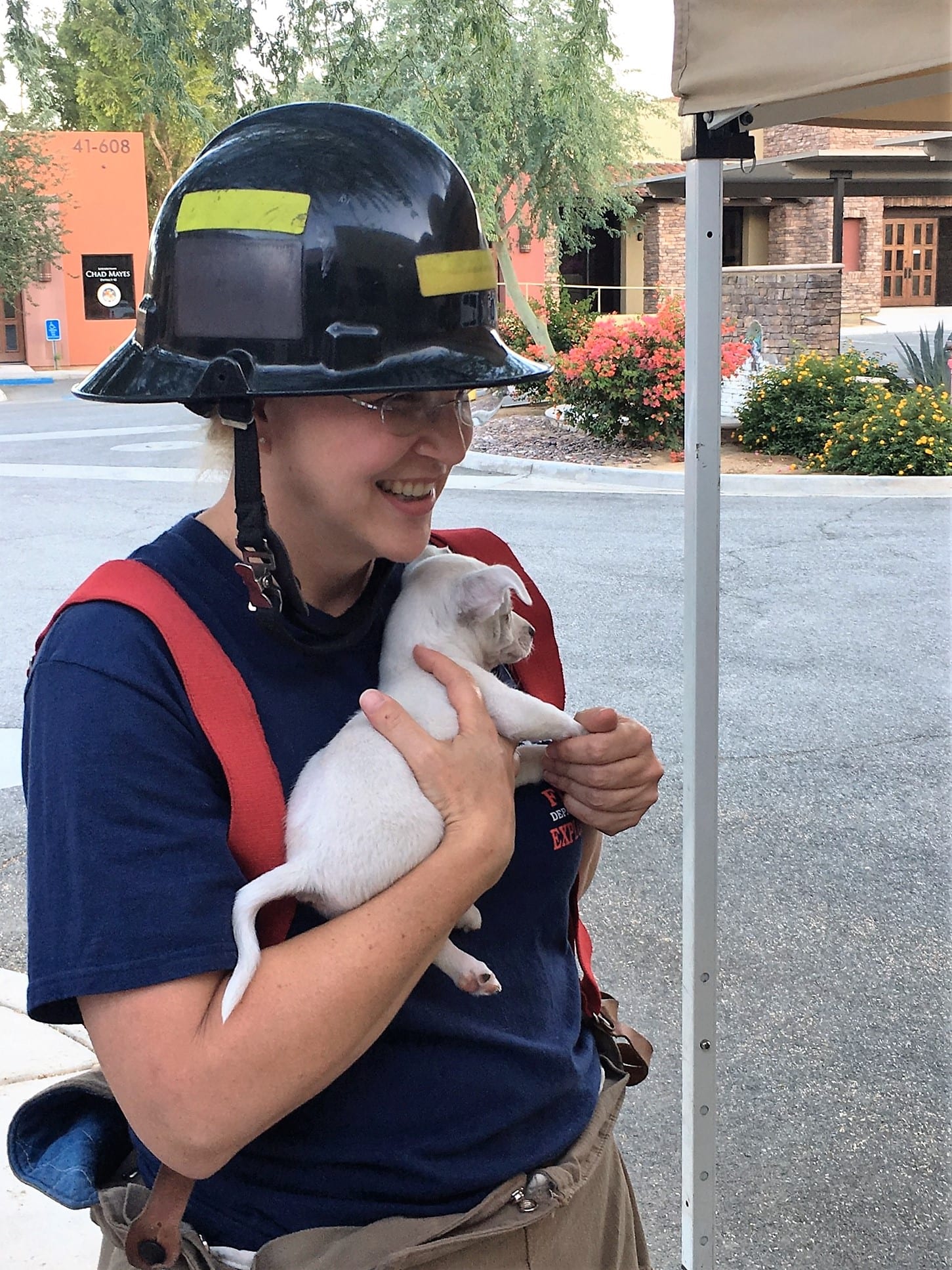 Fire chief Dr and puppy Bootox
