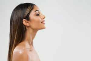 A profile shot of a woman after KYBELLA® in Palm Springs
