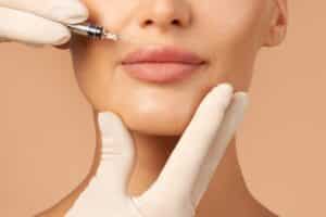A woman getting JUVÉDERM® in her lips in Palm Springs